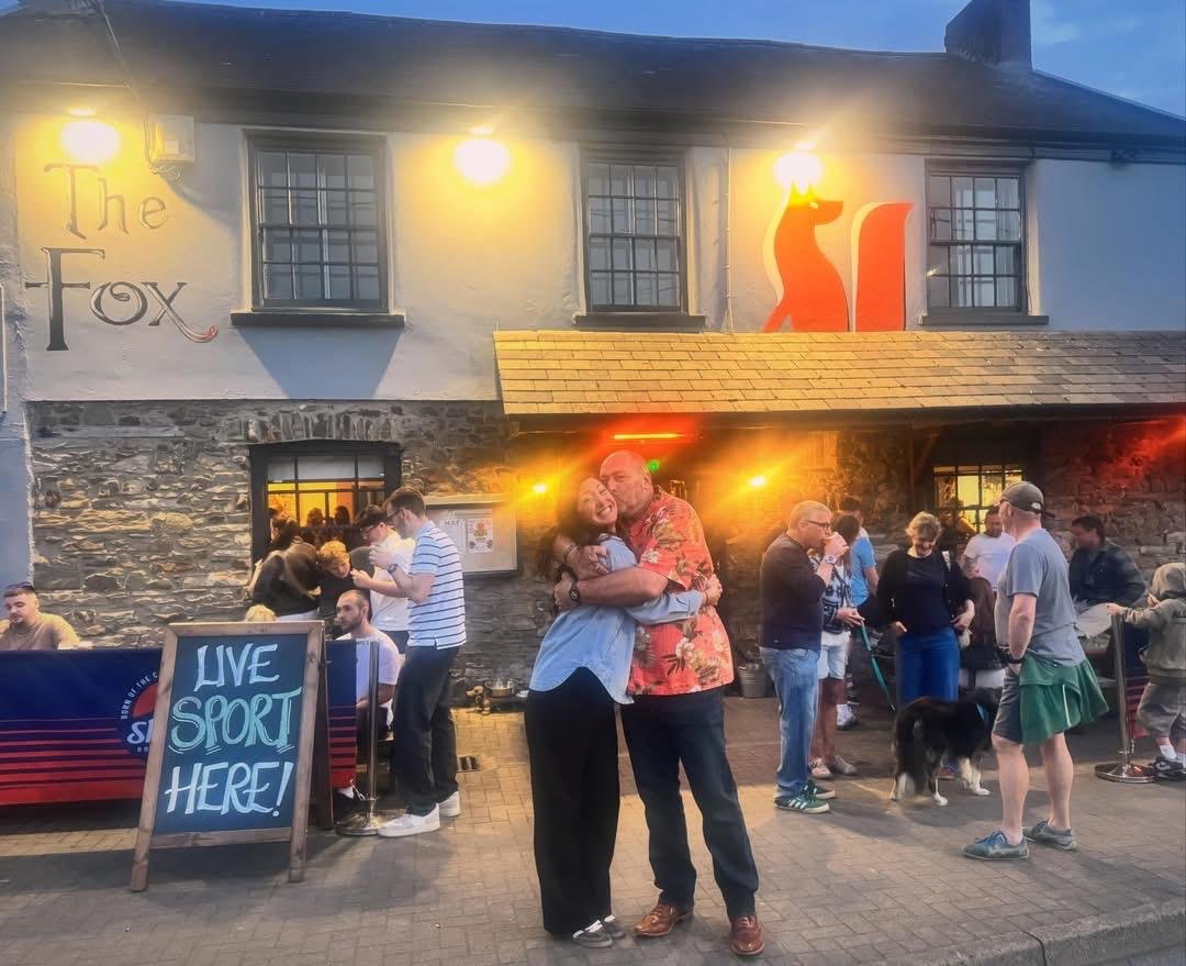 Busy evening outside The Fox pub in Fremington